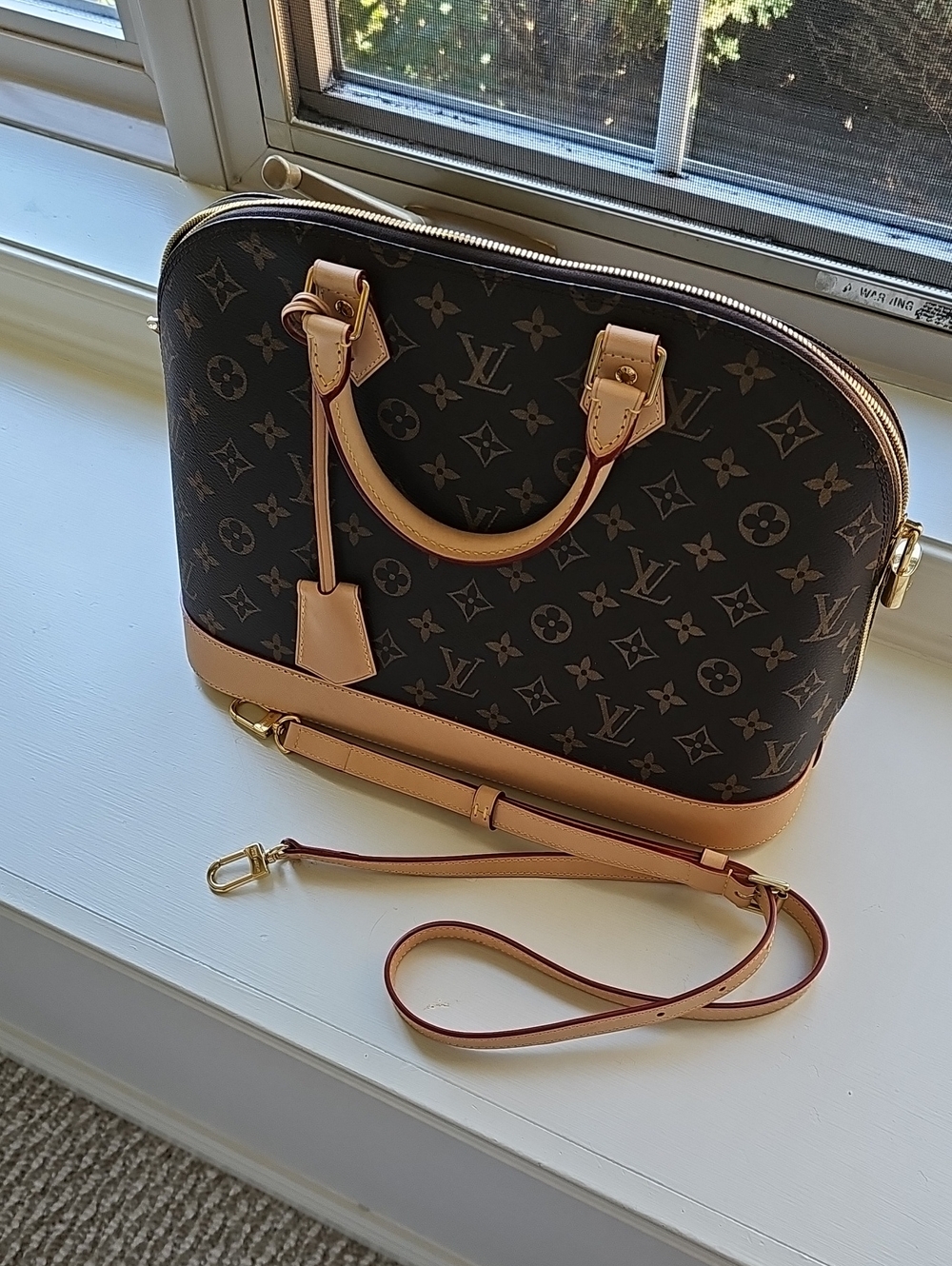Louis Vuitton Monogram Alma Satchel in Brown with Natural Vachetta Trim